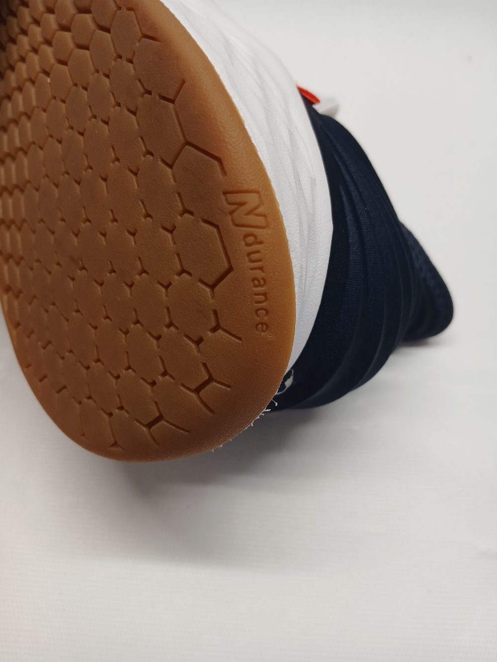 New Balance Men’s White & Navy Athletic Sneaker - Picture 7 of 15